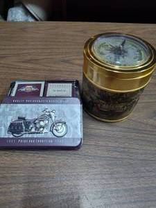 lot 488 image: Motorcycle tin with two decks of cards compass container