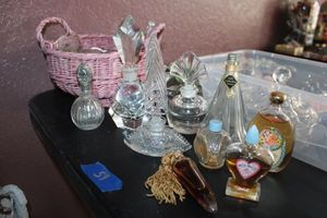 lot 59 image: Vintage Perfume bottles and extra crystal stoppers