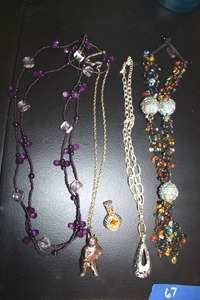 lot 67 image: Jewelry Silver metal and multibed necklaces