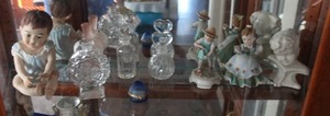 lot 106 image: GOEBEL gardener figurine, Vintage ceramic baby figurines and perfume bottles, see photos