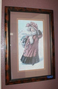 lot 119 image: Wall art framed print - girl in Christmas winter coat