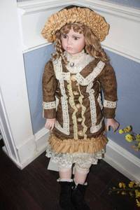 lot 54 image: 4 foot Porcelain doll with stand