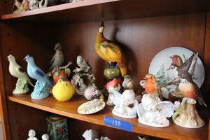 lot 138 image: Bird figurines, Cherub pair of figurines,  and GOEBEL bird plate