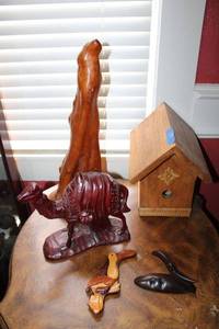 lot 171 image: Wood carved items birdhouse, camel and more