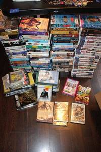 lot 117 image: VHS and DVD movie collection plus a few Xbox games