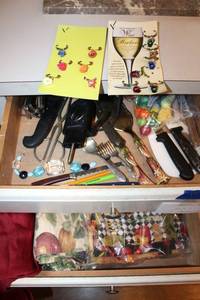 lot 183 image: Misc. lot wine bottle rings, Vegetable flatware, Heavy brass Serving cutlery set, tablecloth, placemats and more