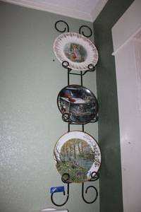 lot 195 image: Collector plates with wall rack (bring tools to remove)