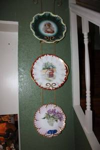 lot 196 image: Collector plates with wall rack (bring tools to remove)