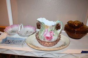lot 231 image: Pink and amber glass items, vintage flower bowls and pitcher