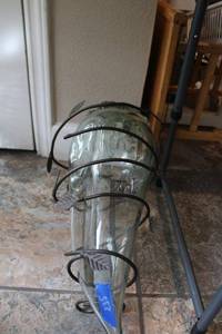 lot 235 image: Large glass chili pepper in wire stand