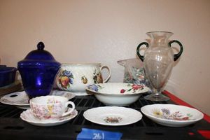 lot 261 image: Misc. bowls and dishes, blue glass candy dish, clear vase with green handles and glass beads