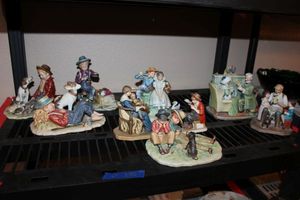 lot 250 image: Norman Rockwell figurines and book