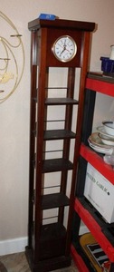 lot 267 image: Narrow book stand with clock