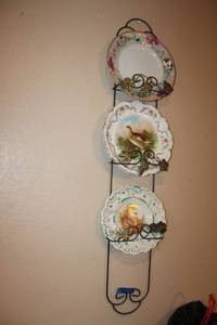 lot 269 image: Wall mount plate hanging with plates