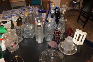 lot 287 image: Clear and blue glass bottles and more