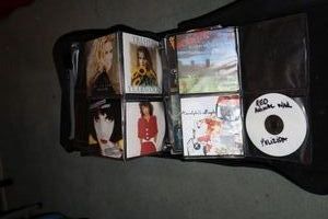lot 370 image: DVDs and portable CD bag