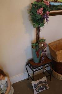 lot 323 image: Small table, decorative topiary plant and pillow