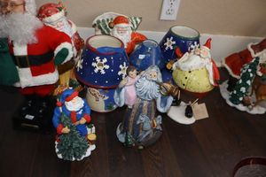 lot 404 image: Blue Santas and candle holders, and more