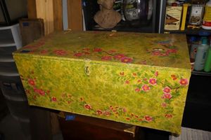 lot 524 image: Painted storage trunk with contents