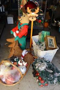 lot 632 image: Christmas wreath, animated dog and reindeer stand, reindeer statue and more
