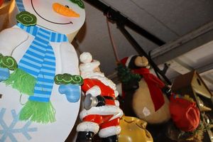 lot 627 image: Christmas Snowman, Santa, and bear statues, and spice cabinet