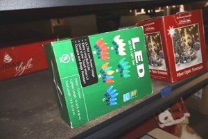 lot 626 image: LED light set, ornaments, Santa figurine, and fiber optic fountain