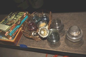 lot 621 image: Vintage glass light insulators, candles
