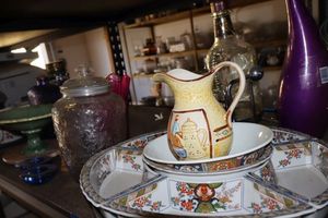 lot 609 image: Asian style divided serving tray, ceramic pitcher, brown marble trivet, and more