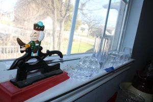 lot 348 image: Prism light blocks, clear vase, cast iron nut cracker, and paper weight