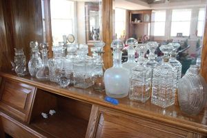 lot 424 image: Clear bottles and decanters