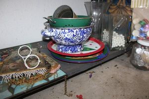 lot 483 image: Metal strainers, stained glass panel, tea lights and more
