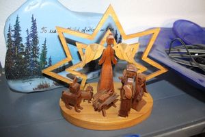 lot 497 image: Blue glass light fixture, painted rock, wooden manger scene