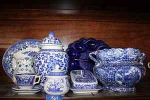 lot 504 image: Blue and white dishware with blue glass egg platter