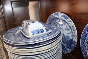 lot 503 image: Blue and white plates and butter dish