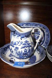 lot 513 image: Blue and white dishware with pitcher and basin