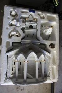 lot 595 image: White ceramic Christmas set - church and figurines
