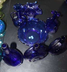 lot 373 image: Blue glass bowls and bottles