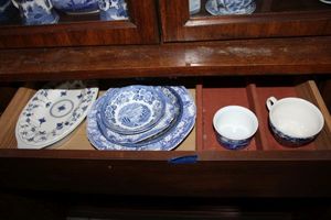 lot 516 image: Blue and white dishes in drawer