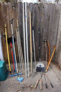lot 553 image: Walking canes, yard tools, light changing rod and more