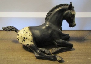lot 33 image: Breyer horse toy laying down black foal Appaloosa Traditional