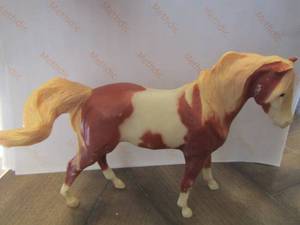 lot 61 image: Breyer molding co American paint horse pinto figurine silver logo belly vintage