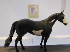 lot 93 image: black withwhite spots Breyer horse