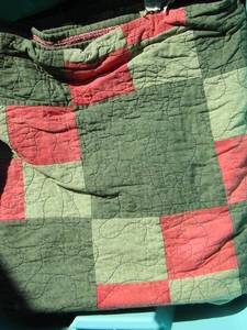 lot 169 image: tote full of quilts