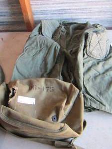 lot 8 image: green army jacket, army bag