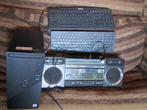 lot 253 image: dell computer monitor, 2 keyboards, radio