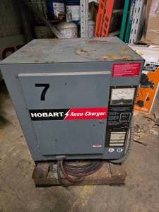 lot 153 image: Hobart Accu-Charger Model 600B1-12 24V 208240480 Single Phase Electric Forklift Charger on Pallet