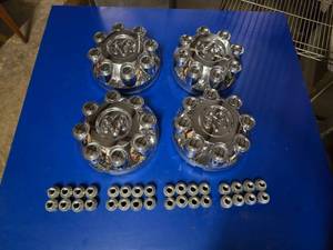 lot 157 image: Set of 4 Dodge Ram 8 Bolt Wheel Center Caps w Lug Nuts