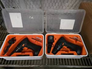 lot 205 image: 2 IKEA Cordless Drill Sets w Attachements.  Drills are a little sticky from age.