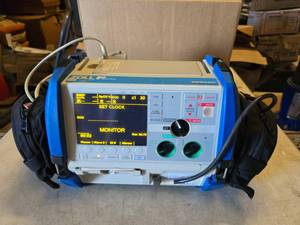 lot 23 image: WOW  BIG $$ Zoll M Series Defibrillator.  Powers Up & Tested