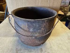 lot 111 image: Large Cast Iron Pot w Handle & Feet.  Marked 7-Y On Bottom